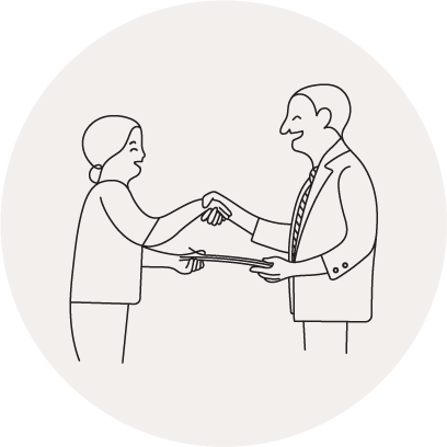 Woman and man shaking hands while holding paperwork.